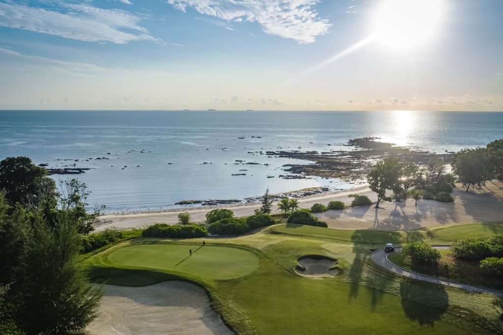 view of the golf course next to the beach